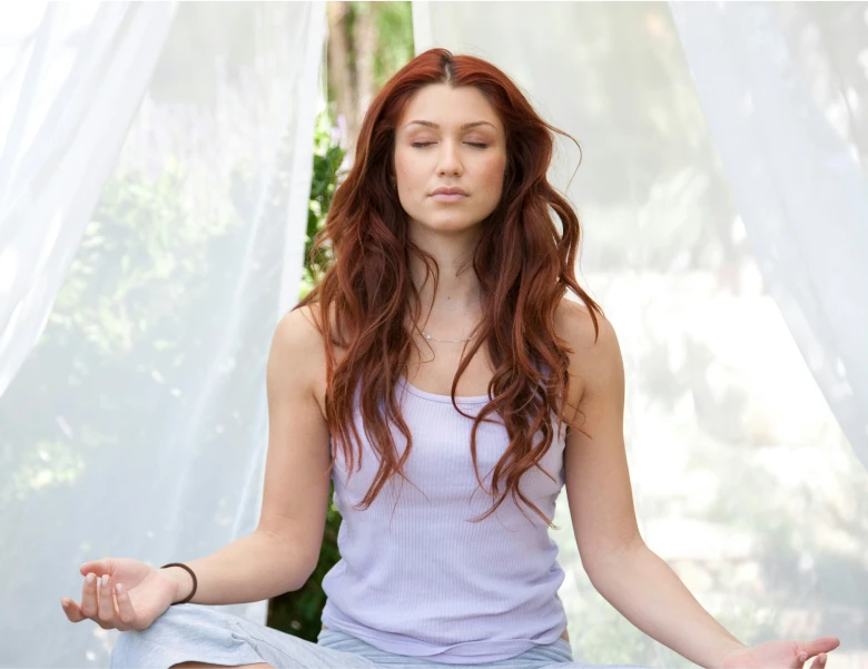 a woman meditating